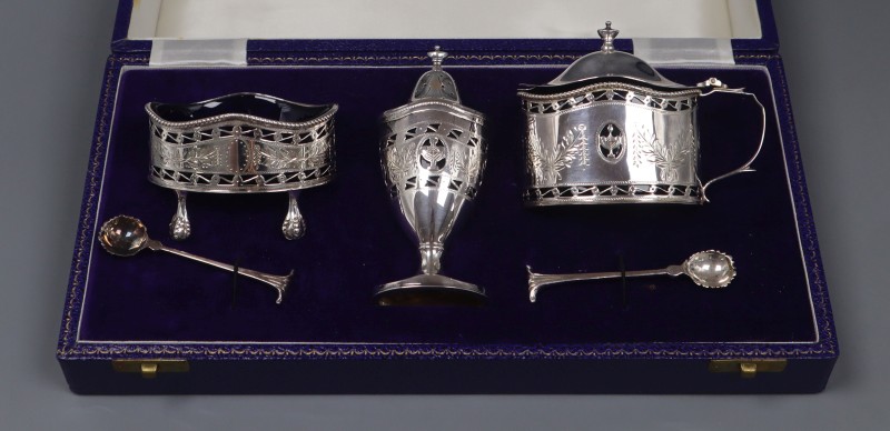 A cased modern Georgian style silver three piece condiment set, Da-mar Silverware, London, 1978/9.